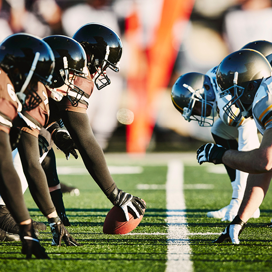 Eine Gruppe von Fussballspielern auf dem Feld während des USA Spiel Spektakels.